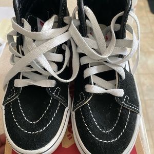 White and black Vans. Size 12c.